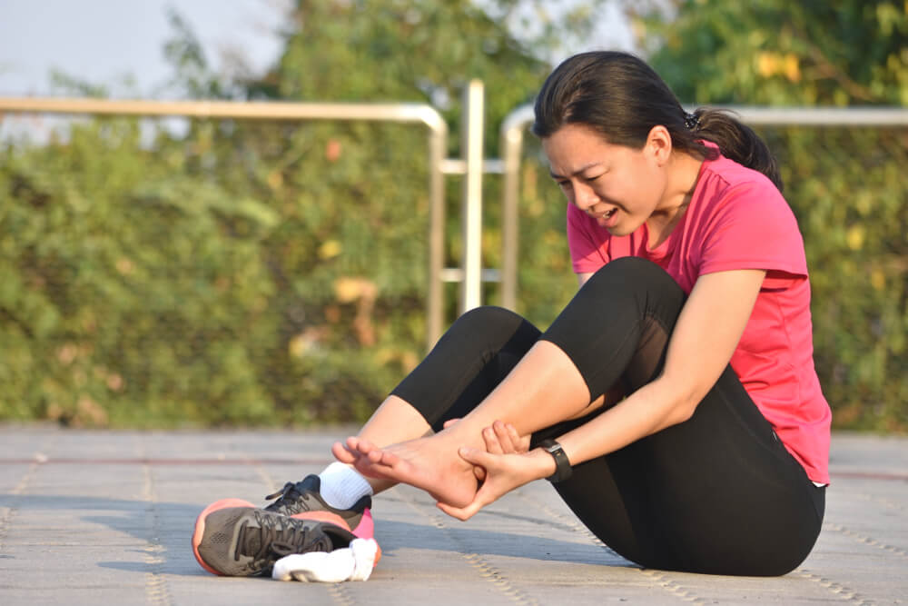 What causes severe pain in the back of the ankle?