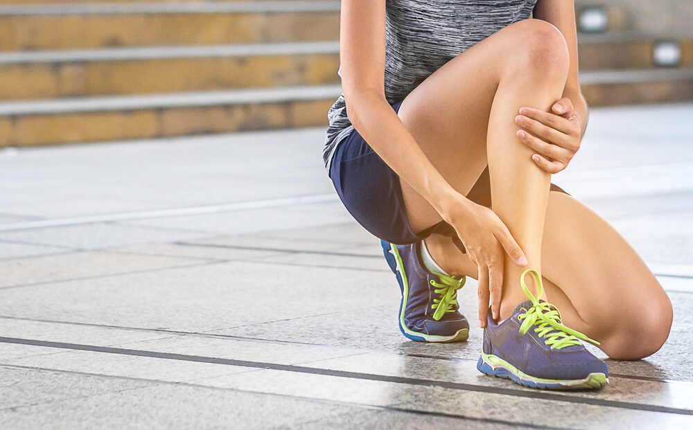 What is causing pain in the side of my ankle?