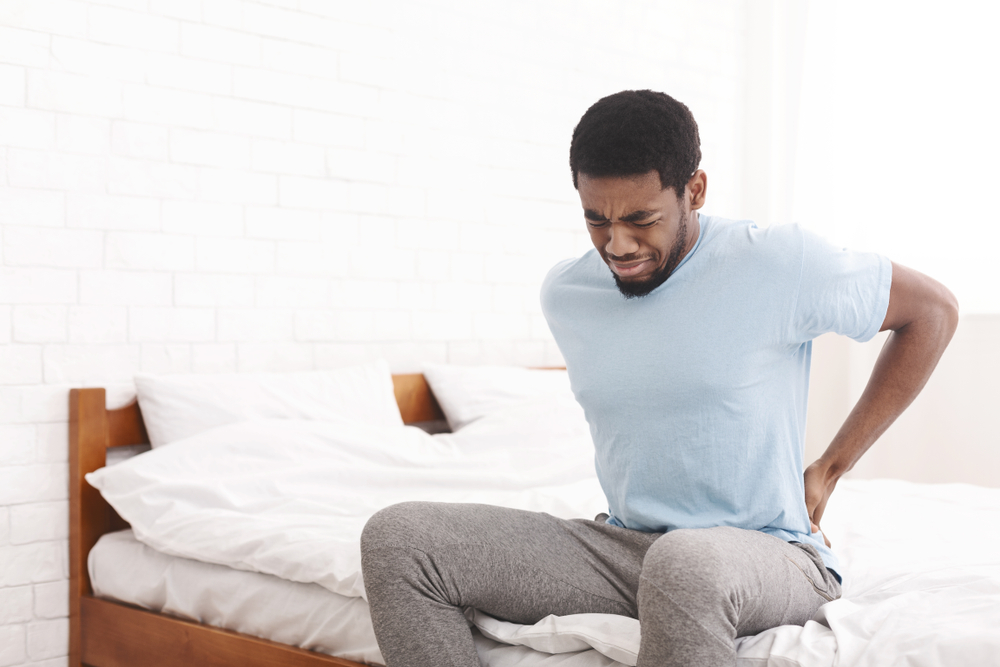 3 possible reasons why my back hurts when I lay down